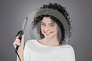 Woman with Curling Iron