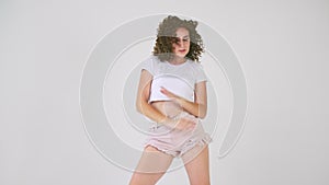 Woman with curls dancing