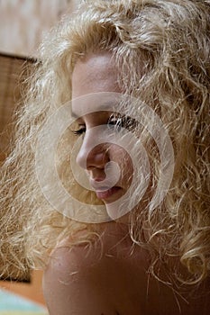 Woman with curly blond hair