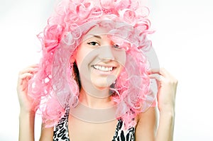 Woman with curly pink hair