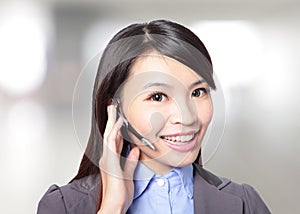 Woman customer support operator with headset