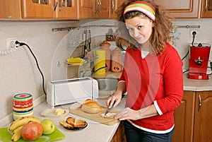Woman cutting bread