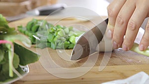 Woman cutting onion