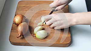 Woman cutting onion