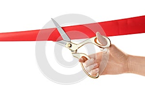 Woman cutting red ribbon