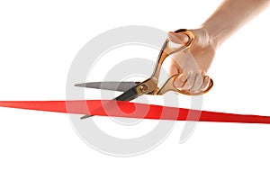 Woman cutting red ribbon