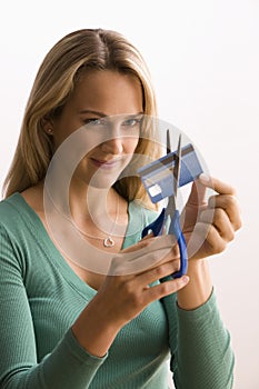 Woman Cutting Up Credit Card
