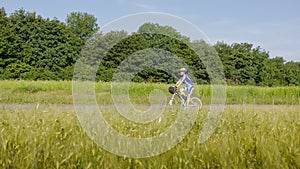 Woman cycling photo