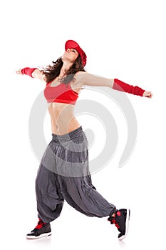 Woman dancer with arms extended