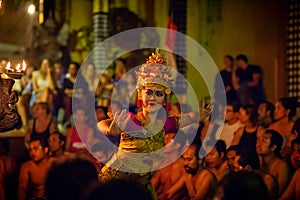 Woman dancer in traditional costume at a kecak fire dance, Ubud, Bali, Indonesia