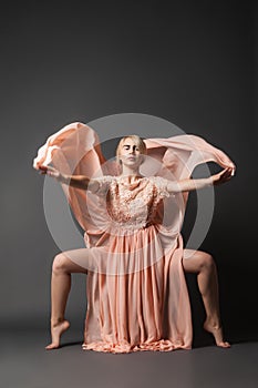 Woman dancing in chiffon dress