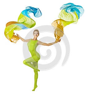 Woman dancing with flying colorful fabric, white b