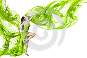 Woman dancing in green dress, fluttering waving fa photo