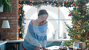 Woman dancing in the kitchen