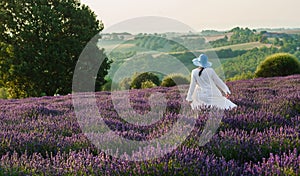 Woman dancing in lavender field