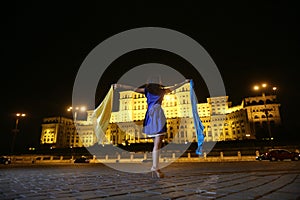Woman dancing in the night city view