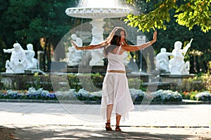 Woman dancing in park