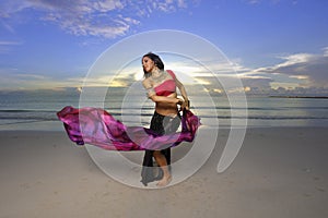 Woman dancing with a veil