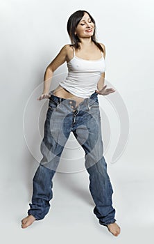 Woman dancing and wearing boyfriend s jeans