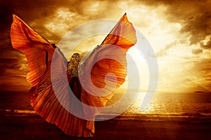 Woman Dancing Wings Dress, Fashion Art Model Flying on Ocean Sky photo