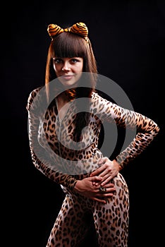 Woman in dappled catsuit