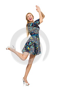 Woman in dark blue floral dress isolated on the