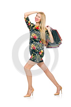 Woman in dark green floral dress isolated on the