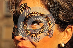 Woman with a dark mask