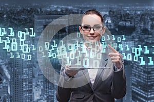 The woman in data management concept with tablet