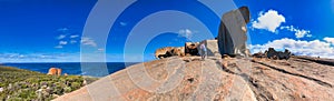 Woman and daughter visit Remarkable Rocks in Kangaroo Island, panoramic view
