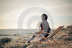 Woman in a deck chair