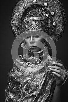 Woman in decorative kokoshnik head wear