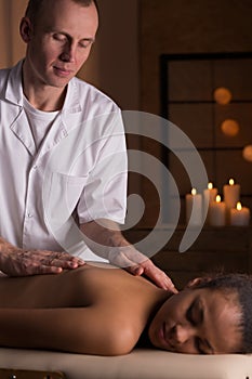 Woman and deep tissue massage