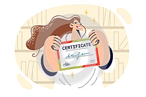 Woman demonstrates certificate received for excellent performance of professional tasks