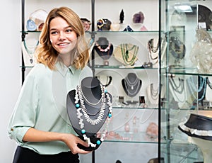 Woman demonstrating natural pearls