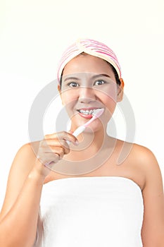 Woman with dental braces holding toothbrush
