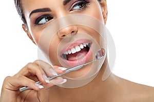 Woman with dental mirror