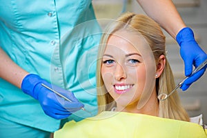 Woman in dentist office for dental check up