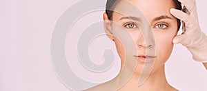 Woman derma treatment. Facial aesthetics anti age analysis. Cosmetology photo