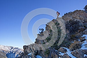 Woman Descending Mountain Ridge