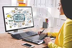 Woman designer drawing a web design sketch