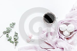 Woman desk with plant, coffee and marsh-mallow in spring desing on white background flat lay mock-up