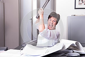 Woman is destroying her PC - overworked photo