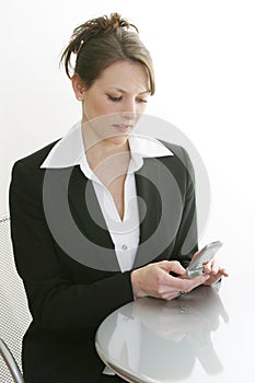 Woman dialing cell phone