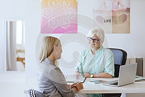 Woman in dietician`s office photo