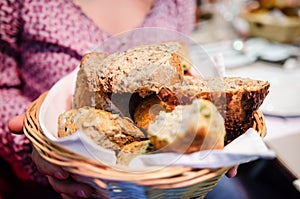 Woman with different types of bread