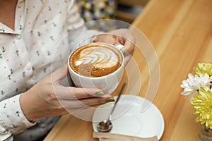 Woman dinner with cheessecake and coffee at restaurant