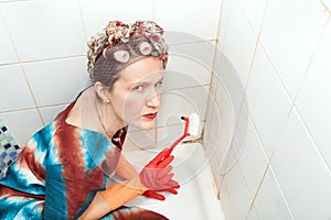 Woman and dirty bathroom