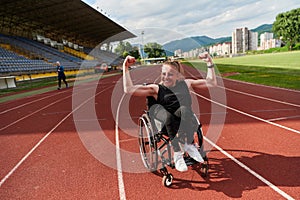 A woman with disability in a wheelchair showing dedication and strength by showing her muscles