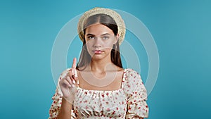 Woman disapproving with no sign make negation finger gesture. Denying, Rejecting, Disagree, Portrait of Beautiful lady